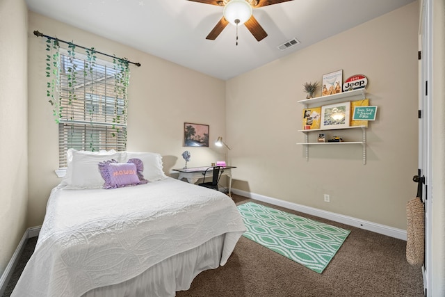 carpeted bedroom with visible vents, ceiling fan, and baseboards