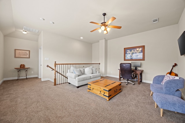living room featuring baseboards, visible vents, a ceiling fan, and carpet floors