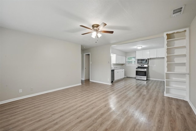 unfurnished living room with a ceiling fan, visible vents, light wood-style flooring, and baseboards