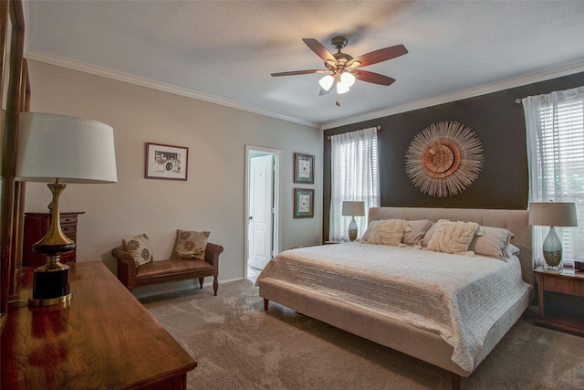 bedroom featuring crown molding, carpet flooring, and ceiling fan