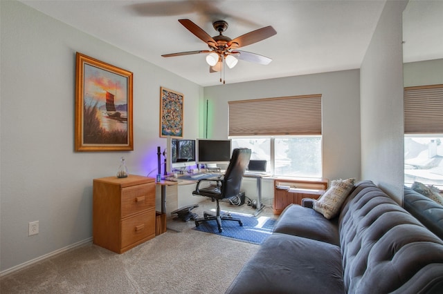 office area featuring a ceiling fan and carpet flooring