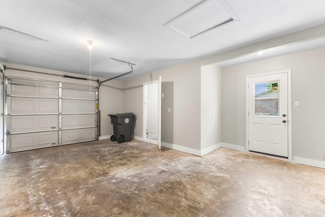 garage with baseboards