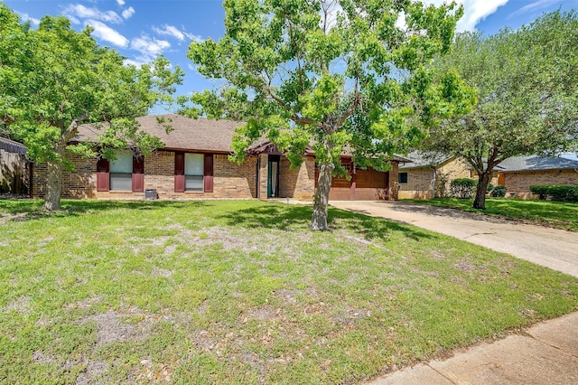ranch-style home with driveway, brick siding, a front lawn, and a garage