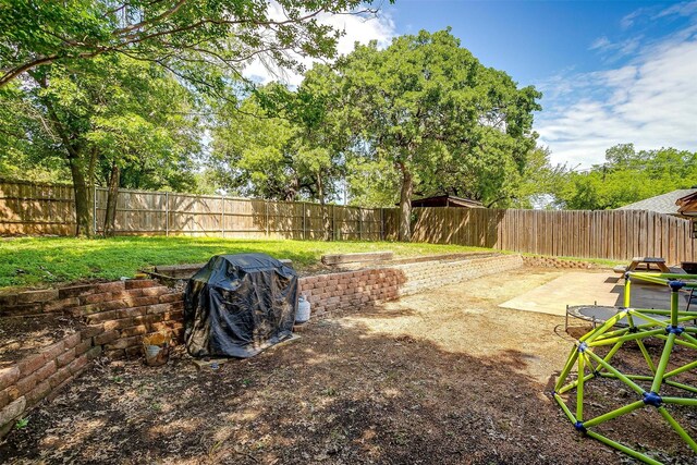 view of yard featuring a patio and a fenced backyard
