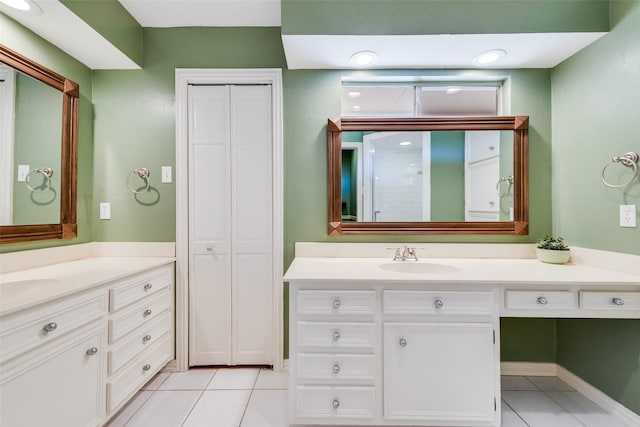 full bath featuring tile patterned flooring and vanity
