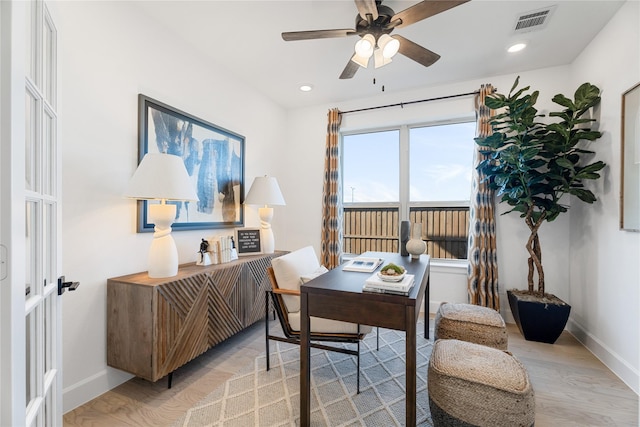 139 Old Glory Ln, Forney, TX 75126 - home office with visible vents, a ceiling fan, light wood finished floors, and baseboards