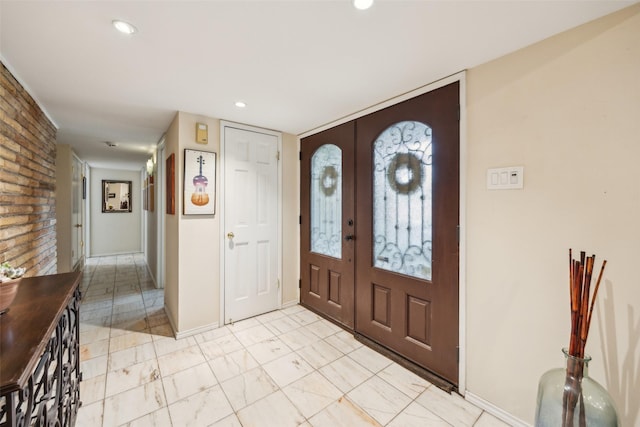 12312 Cox Ln, Dallas, TX 75244 - foyer with baseboards and recessed lighting