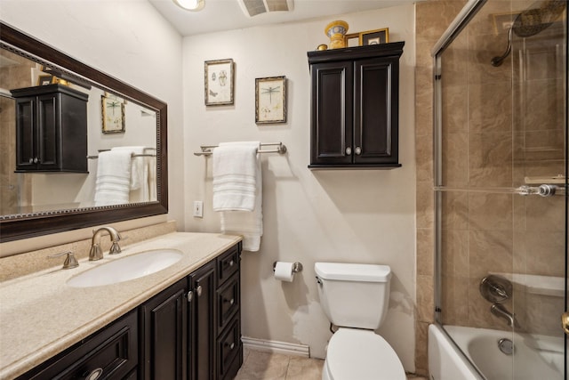 12312 Cox Ln, Dallas, TX 75244 - bathroom featuring vanity, toilet, shower / bath combination with glass door, tile patterned flooring, and baseboards