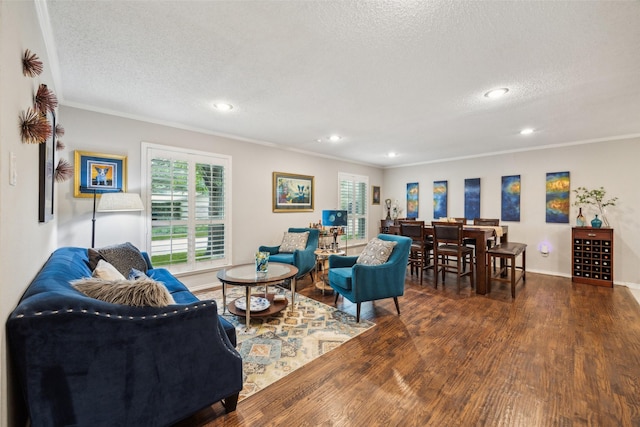 12312 Cox Ln, Dallas, TX 75244 - living room featuring ornamental molding, wood finished floors, a textured ceiling, recessed lighting, and baseboards