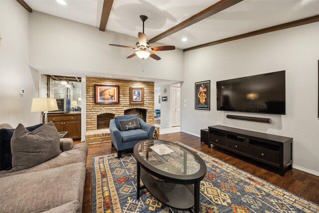 12312 Cox Ln, Dallas, TX 75244 - living room with a ceiling fan, a fireplace, wood finished floors, beam ceiling, and baseboards
