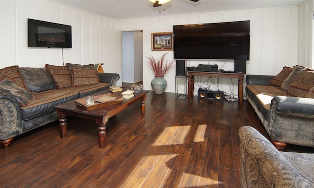 living room with a ceiling fan and hardwood / wood-style flooring