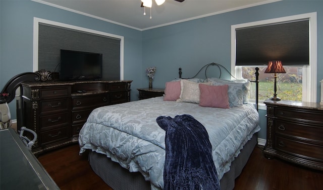 bedroom with wood finished floors, ceiling fan, and crown molding