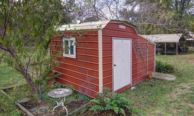 view of outbuilding featuring an outdoor structure