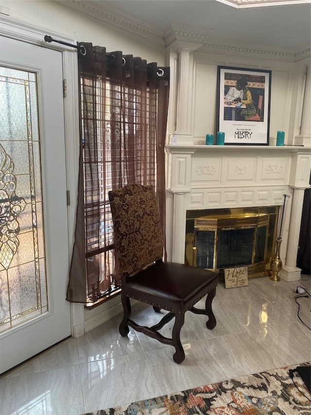 living area with a large fireplace and marble finish floor