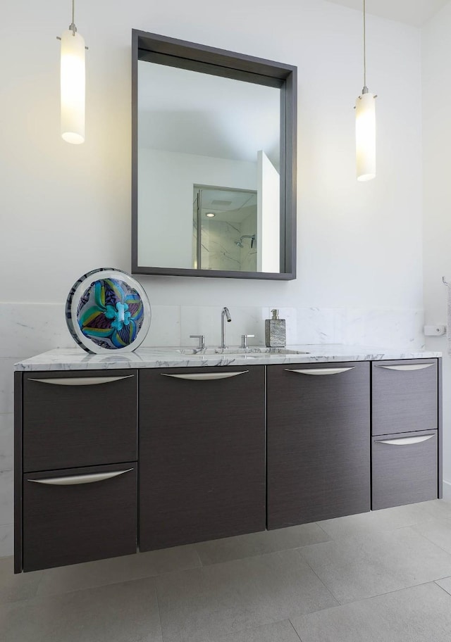 full bath with walk in shower and vanity