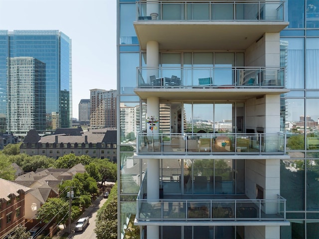 view of building exterior featuring a view of city