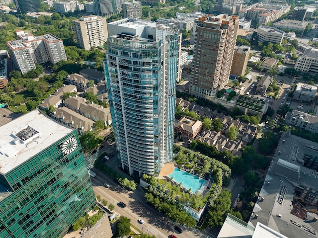 birds eye view of property with a city view