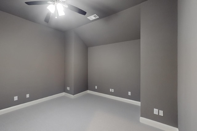 bonus room with carpet floors, baseboards, ceiling fan, and vaulted ceiling