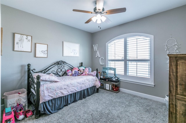bedroom featuring a ceiling fan, carpet floors, and baseboards