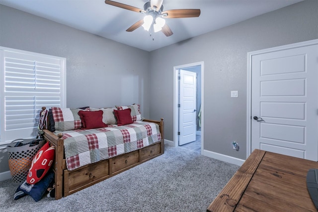 bedroom featuring carpet flooring, ceiling fan, and baseboards