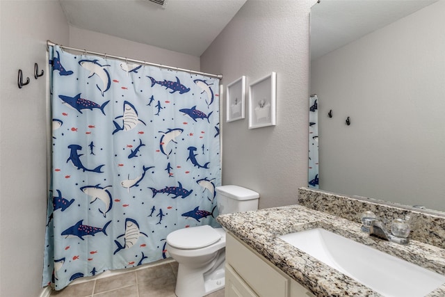 bathroom with tile patterned floors, vanity, toilet, and a shower with curtain