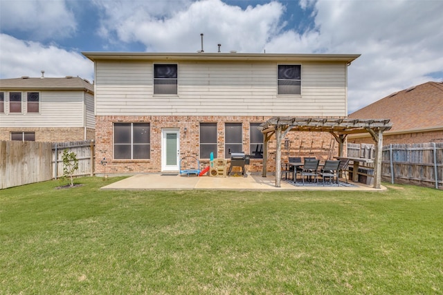 back of house featuring a pergola, a patio, a yard, and a fenced backyard