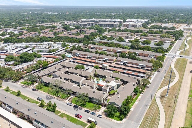 birds eye view of property with a residential view