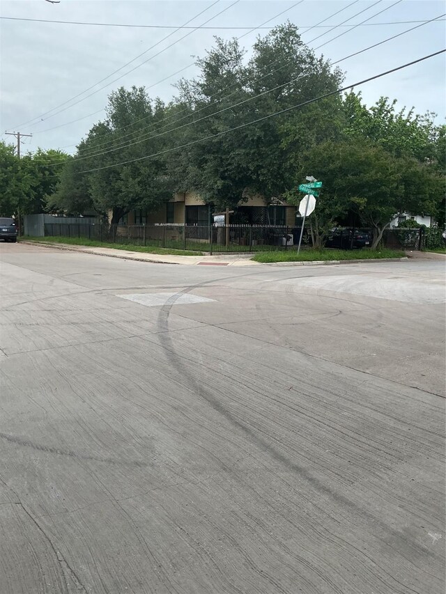 1023 Gallagher St, Dallas, TX 75212 - view of concrete street with curbs and traffic signs