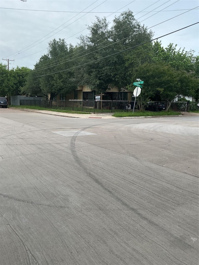 1023 Gallagher St, Dallas, TX 75212 - view of concrete street with curbs and traffic signs