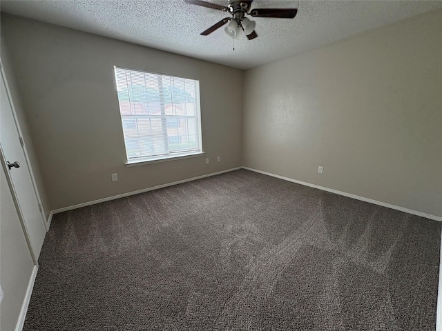 unfurnished room with baseboards, ceiling fan, a textured ceiling, and carpet flooring
