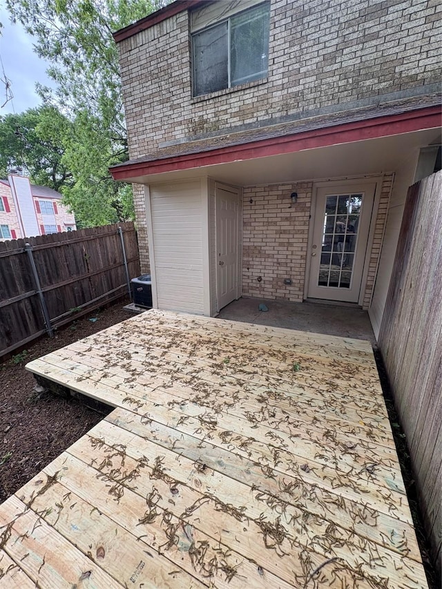 view of patio / terrace with fence and a wooden deck
