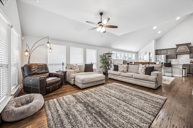 living room featuring a ceiling fan, high vaulted ceiling, dark wood-style floors, and recessed lighting