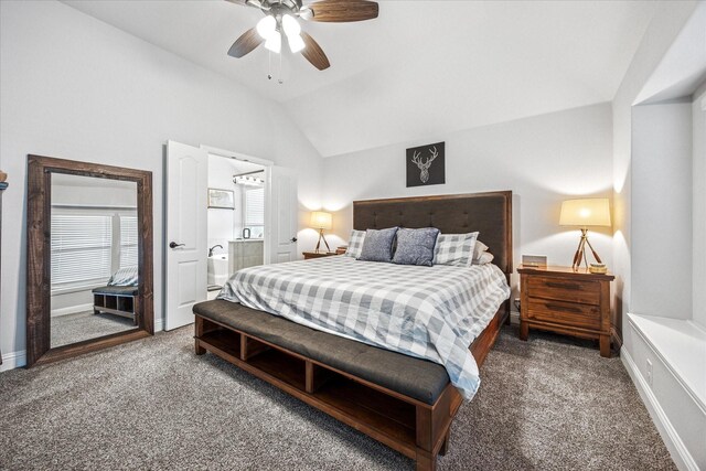 carpeted bedroom with connected bathroom, a ceiling fan, lofted ceiling, and baseboards