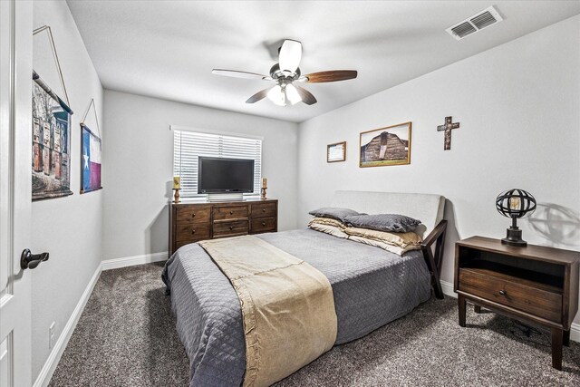 bedroom with visible vents, baseboards, a ceiling fan, and carpet floors