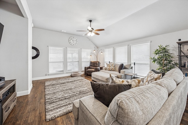 living area with ceiling fan, baseboards, vaulted ceiling, and dark wood finished floors