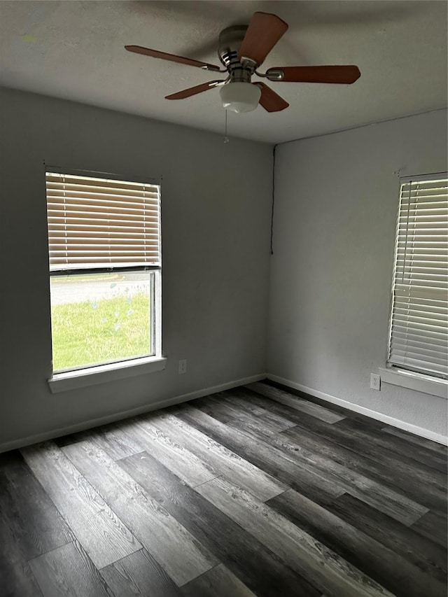 301 Lake Park Ave, Waxahachie, TX 75165 - spare room with baseboards, wood finished floors, and a ceiling fan