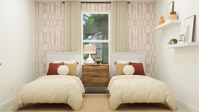 carpeted bedroom featuring baseboards