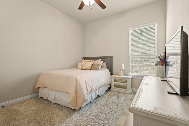 3900 Fordham St, Frisco, TX 75036 - bedroom featuring light tile patterned flooring, a ceiling fan, and baseboards