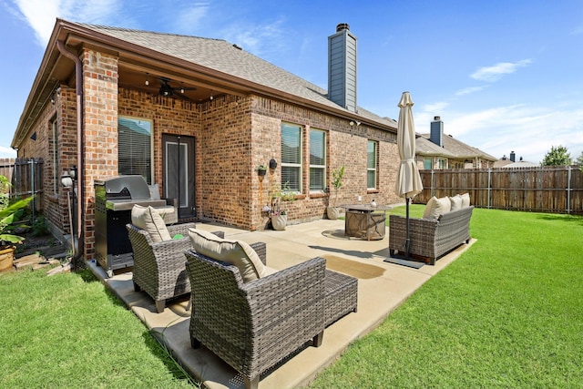 3900 Fordham St, Frisco, TX 75036 - back of house with an outdoor living space, a ceiling fan, a fenced backyard, and brick siding