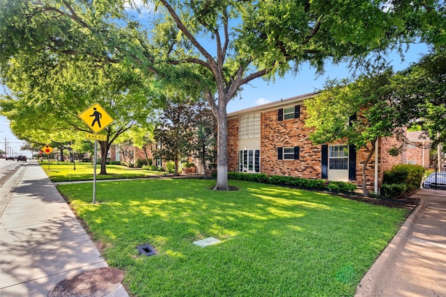 exterior space with a lawn