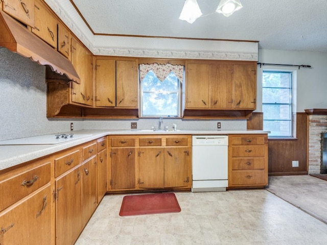 1413 Sylvan Dr, Arlington, TX 76012 - kitchen featuring a sink, a textured ceiling, white appliances, and light countertops