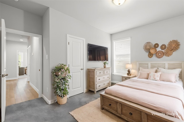 bedroom featuring baseboards