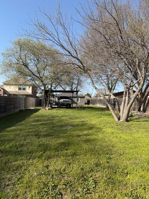 view of yard featuring fence