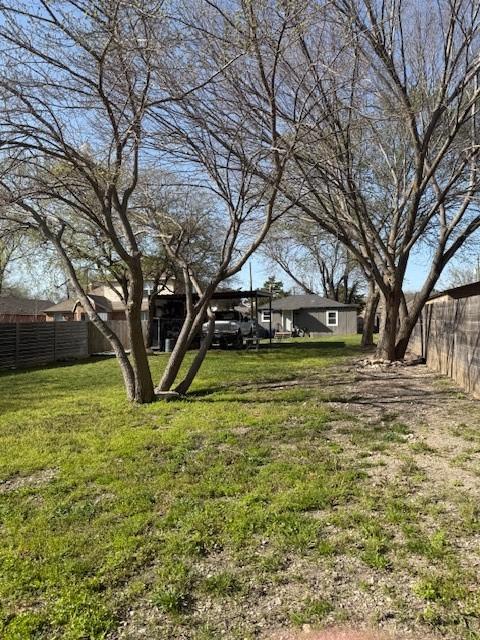 view of yard with fence
