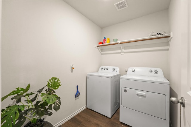 1417 Briar Hl, Denton, TX 76207 - washroom with washing machine and dryer, dark wood-style flooring, and baseboards