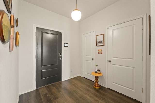 1417 Briar Hl, Denton, TX 76207 - foyer featuring dark wood-style floors and baseboards