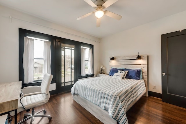 bedroom with baseboards, wood finished floors, ceiling fan, and access to exterior