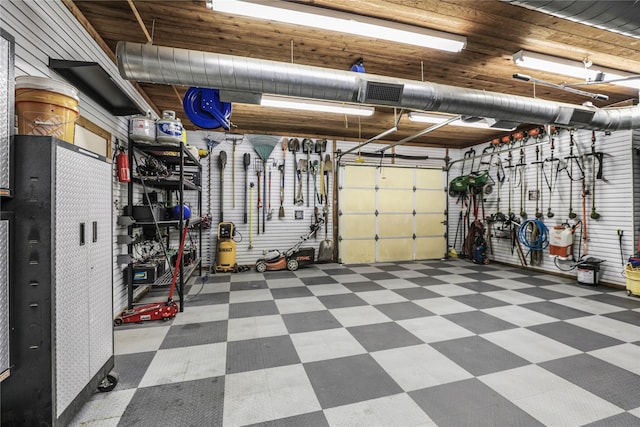 11588 Wild Rose Ln, Anna, TX 75409 - garage with a workshop area and visible vents