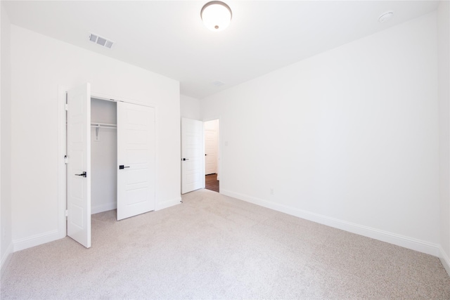 7306 Mallow Way, Venus, TX 76084 - unfurnished bedroom featuring light carpet, a closet, and baseboards