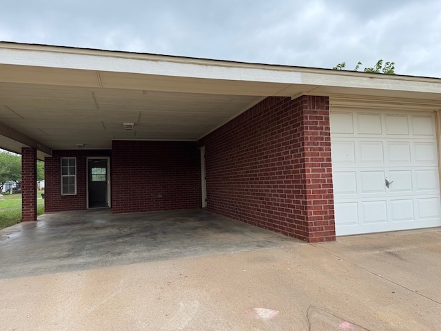 garage featuring driveway